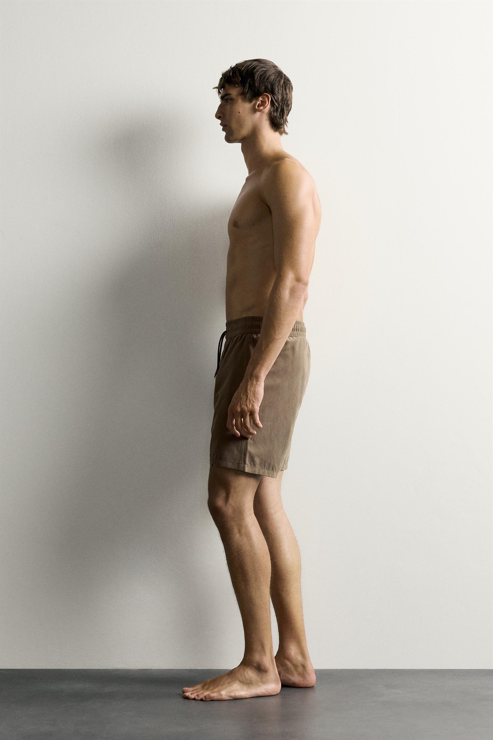 BASIC LONG SWIM TRUNKS